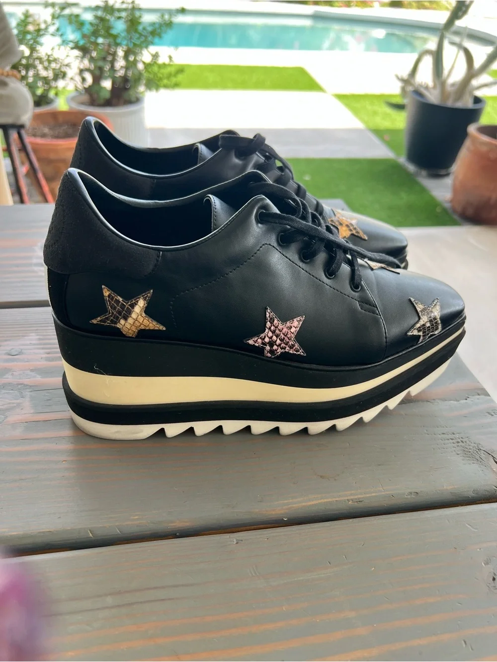 Stella McCartney Black Platform Lace-Up Sneakers with Star Appliqués
